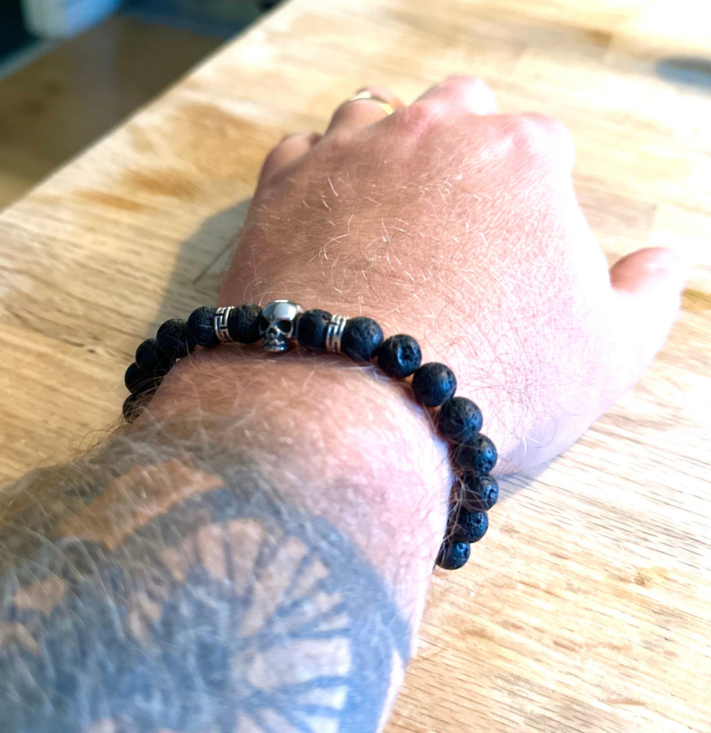 Lavarock beaded skull bracelet in black and white