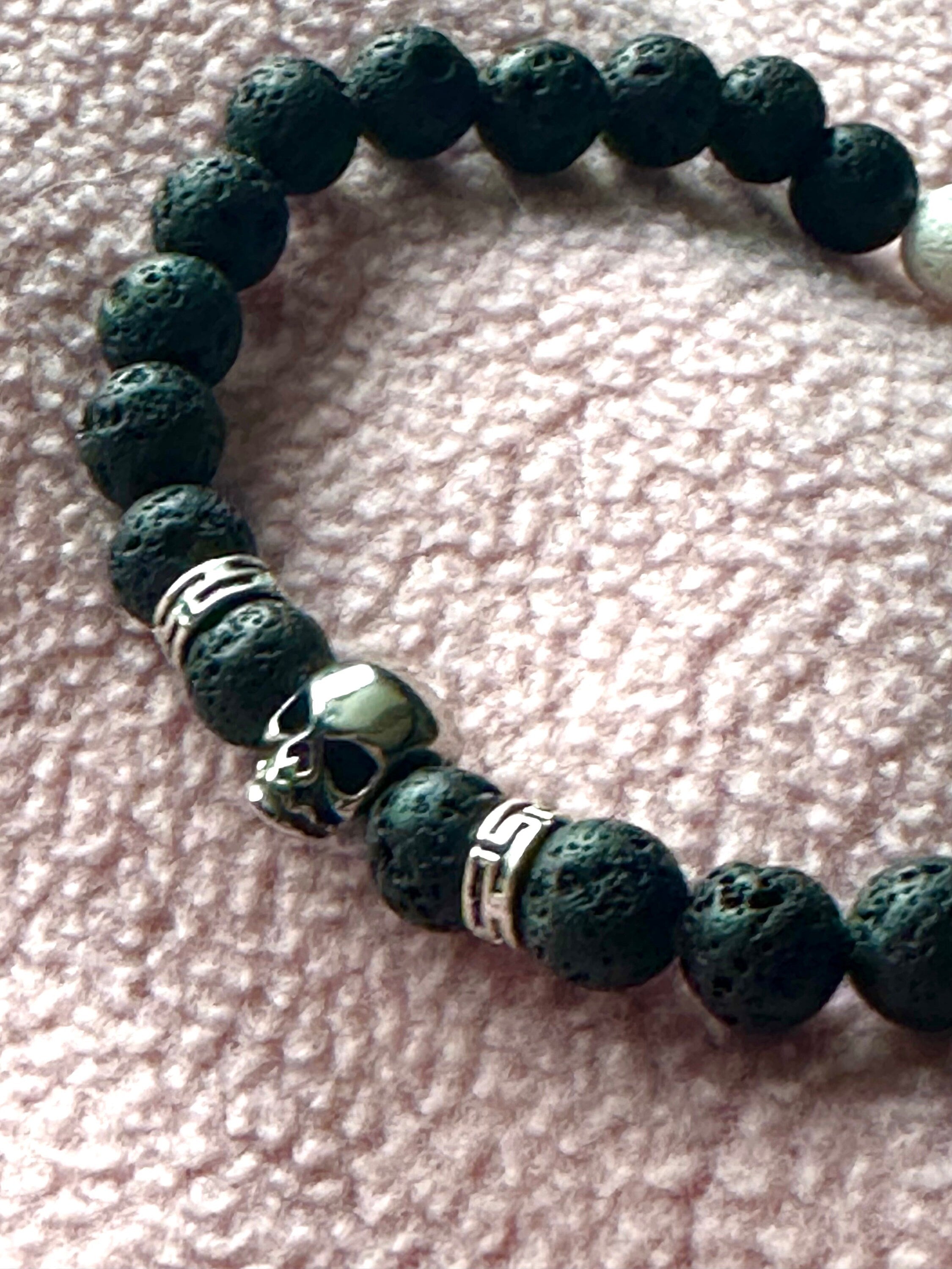 Lavarock beaded skull bracelet in black and white